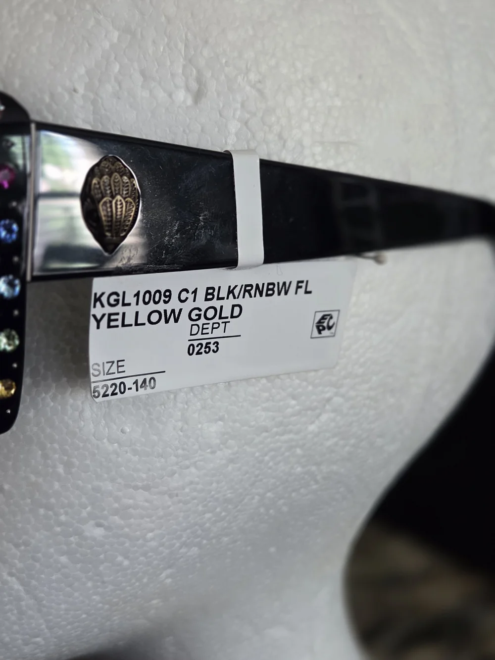 Kurt Geiger Black Frame Sunglasses with Purple Lenses